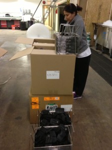 Unloading Contents into Stainless Steel Baskets for cleaning