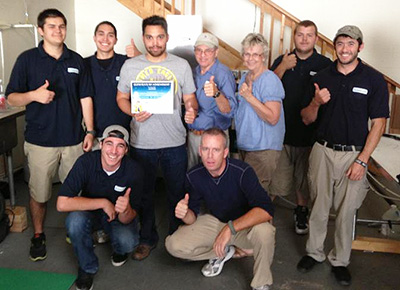 The AmeriDri staff proudly shows off their Training Certificate from Morantz Ultrasonics