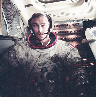 Astronaut Gene Cernan on the Moon in December 1972. His spacesuit is blackened by lunar dust. According to NASA, “a real hazard that might have caused hatch and spacesuit seals to fail on a longer surface mission.” [NASA/JSC]